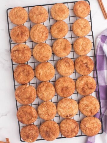 Snickerdoodle cookies on a cooling tray