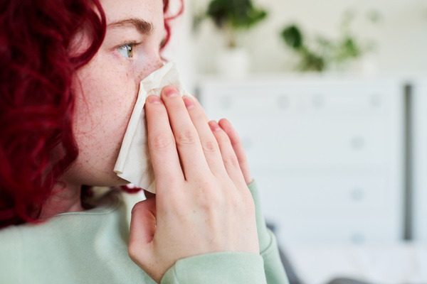 A Sick Girl Cleans a Clogged Nose