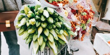 bouquet of flowers on bicycle