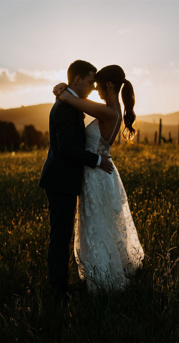 Elegant Vineyard Summer Wedding With White & Orange Florals