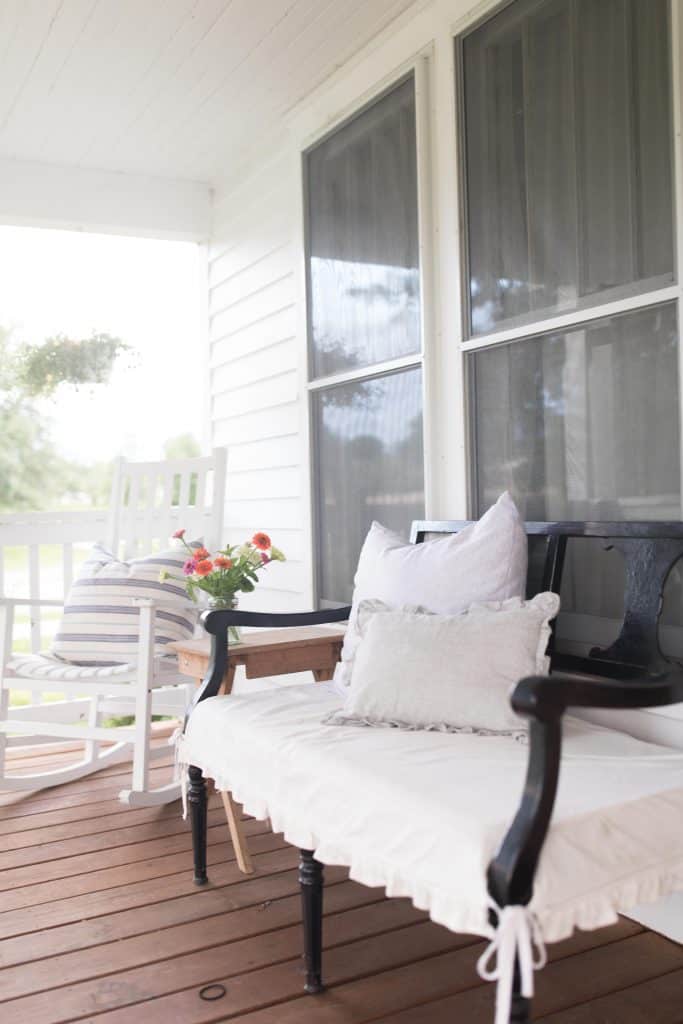 ruffle pillow on a outdoor bench