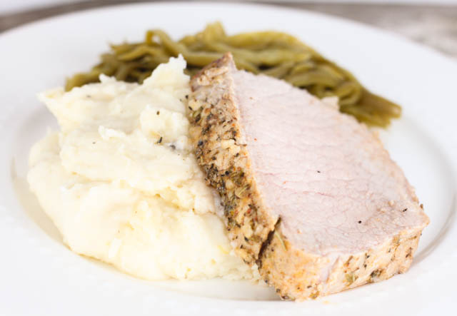 This Rosemary Garlic Pork Loin is a roasted pork loin with olive oil and herbs that will make your house smell amazing and has great flavor!