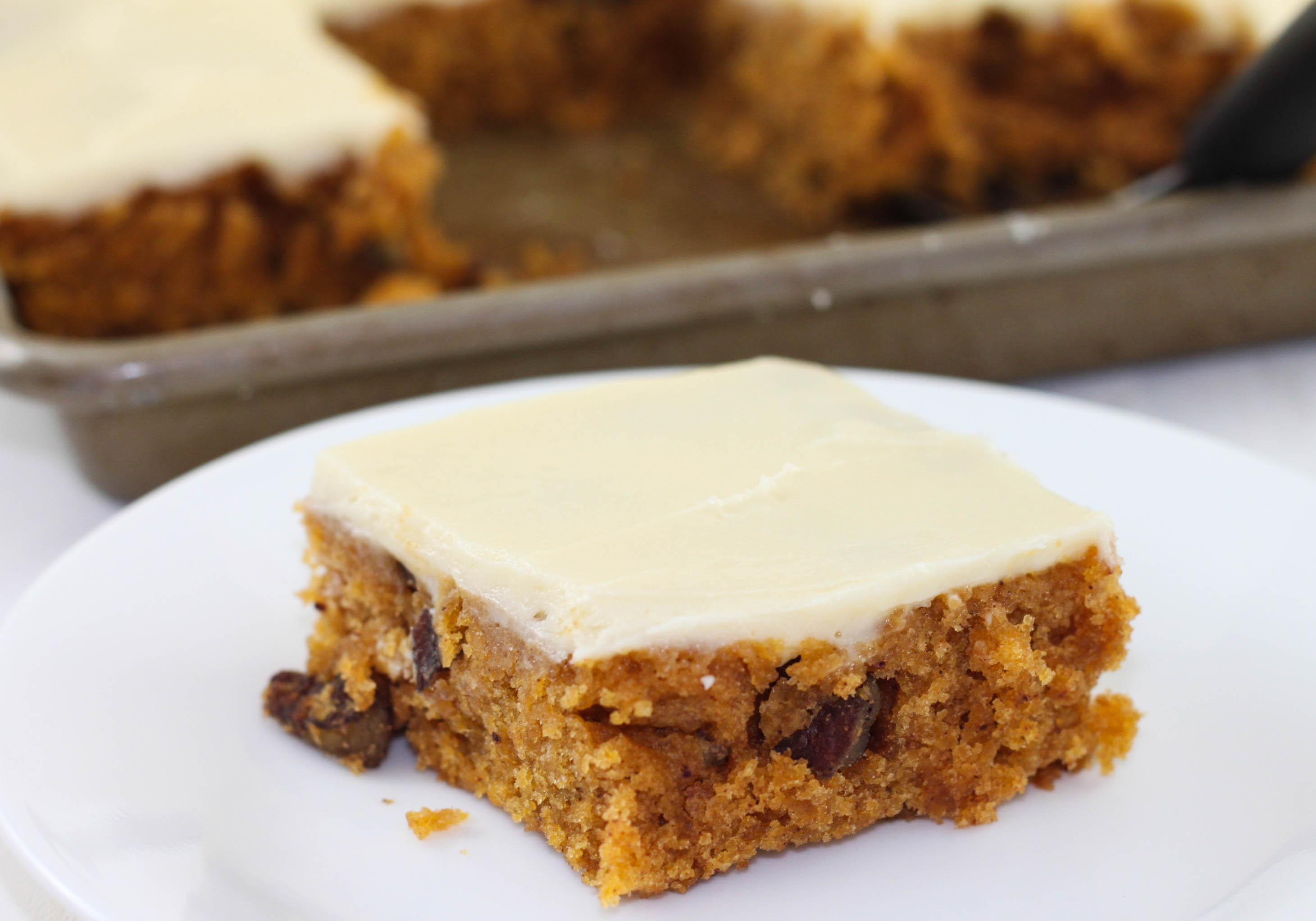 This Pumpkin Sheet Cake is an easy homemade sheet cake that bakes in less than 30 minutes. The cake is topped with cream cheese icing for the perfect fall dessert.