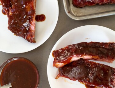 Smoked ribs with a side of bbq sauce