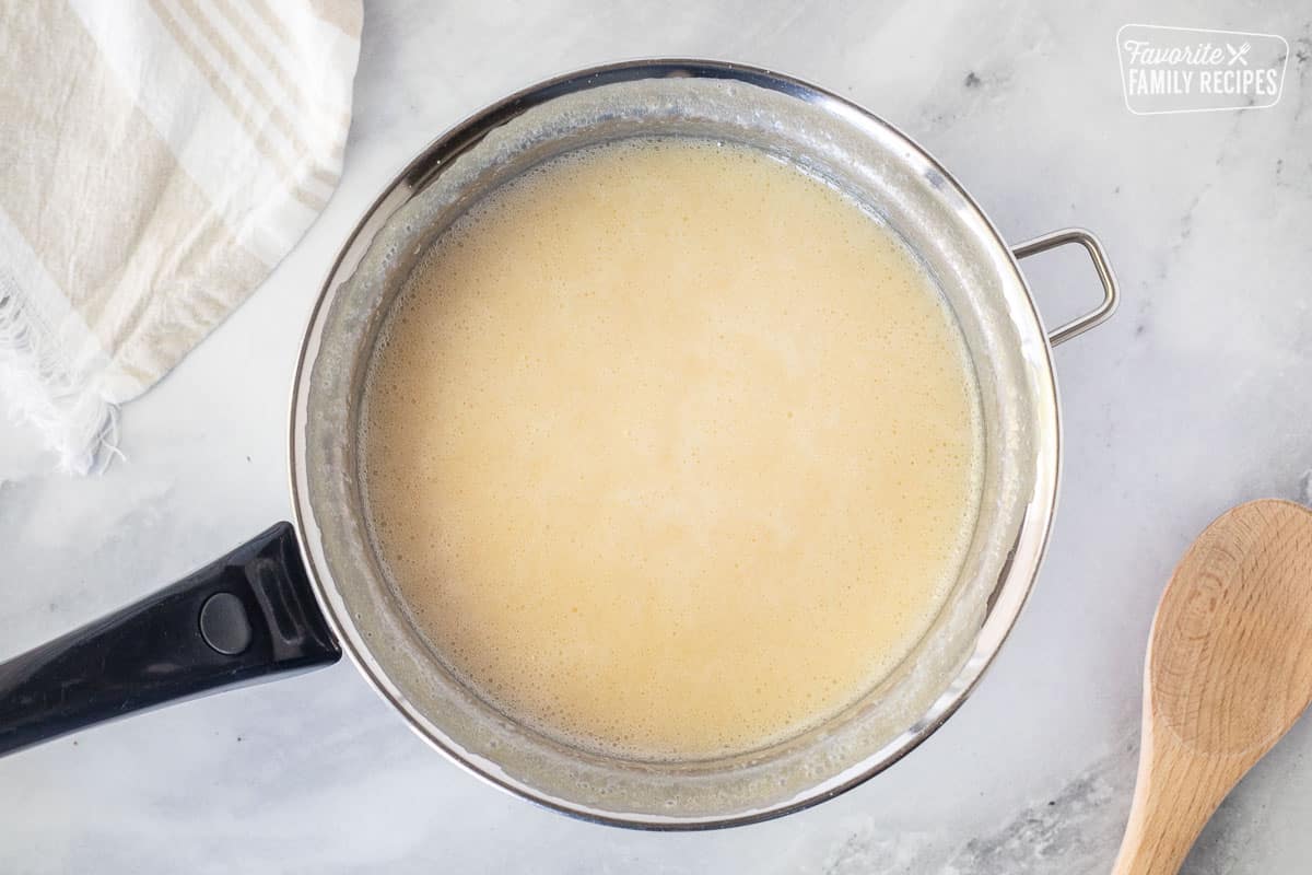 Sauce pan with milk and sugar boiled for See's Fudge.