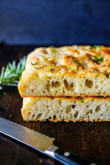 Hands down, this is the best focaccia bread recipe we've ever made! Topped with flaky sea salt and fresh rosemary, it's golden and airy with a crispy bottom. Easy to make. Vegan.