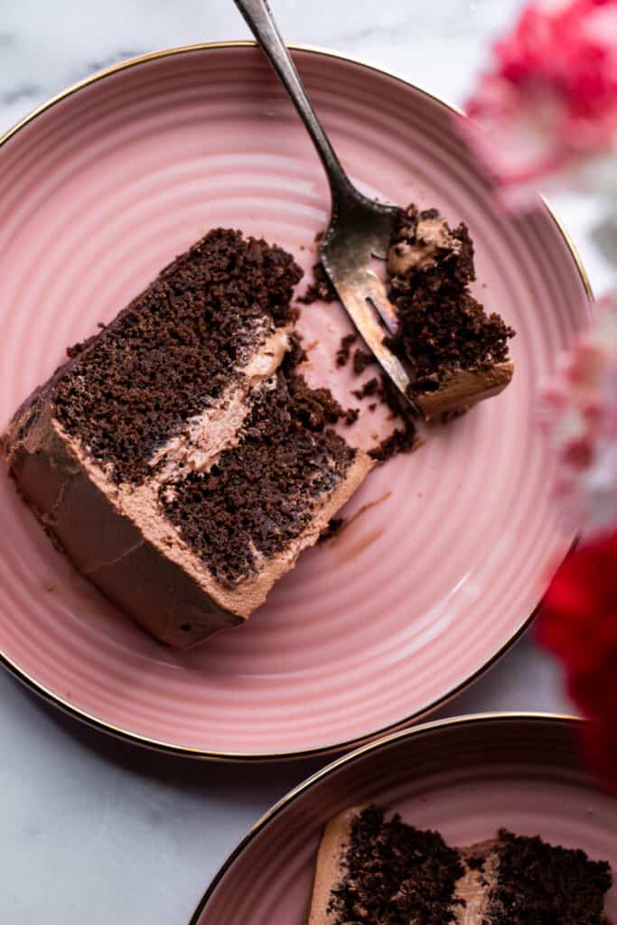 Healthy Chocolate Cake slice on a plate with a fork