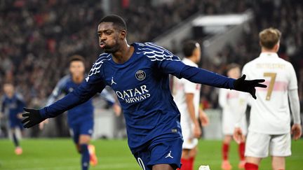 Ousmane Dembélé célèbre le troisième but du PSG contre Stuttgart en Ligue des champions, le 29 janvier 2025. (MARIJAN MURAT / AFP)