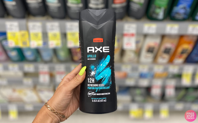 A Person Holding the Axe Mens Apollo Body Wash at Walgreens