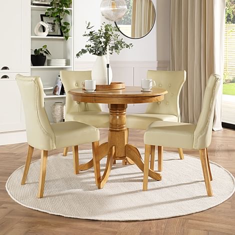 Kingston Round Dining Table & 4 Bewley Chairs, Natural Oak Finished Solid Hardwood, Ivory Premium Faux Leather, 90cm