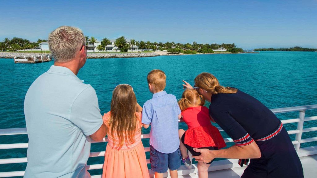 Image of people viewing the coral reef on a Glass Bottom Boat Tour