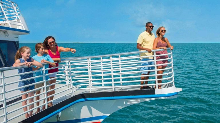 Image of people viewing the Key West waters on a Glass Bottom Boat Tour