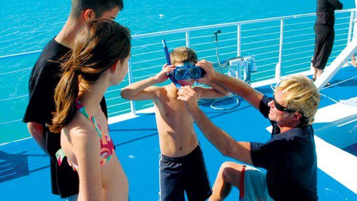 Boy getting ready to snorkel