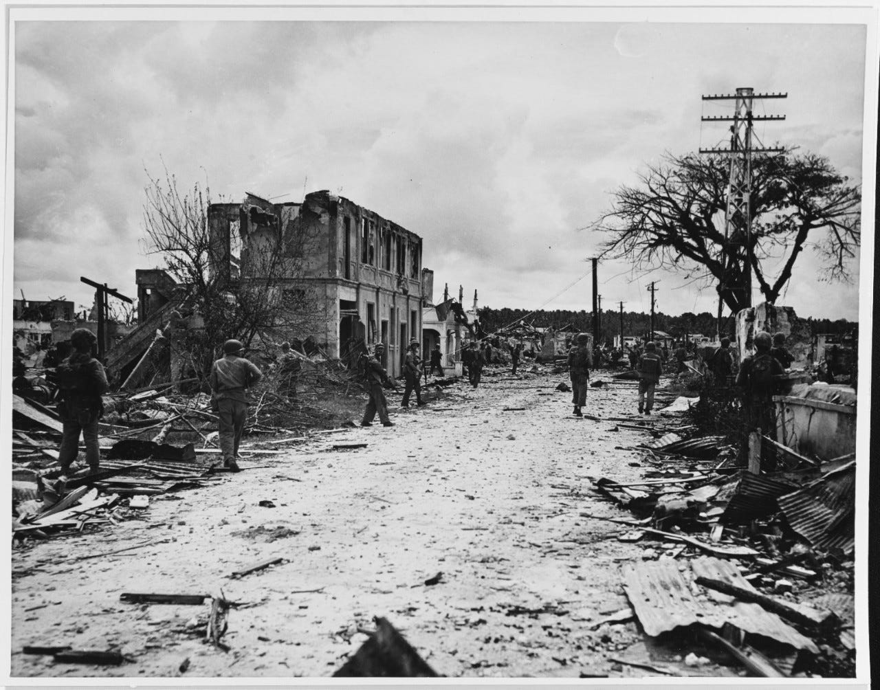 Marines enter the ruins of Agana on July 31, 1944