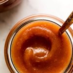 Close up of apple butter in a jar.