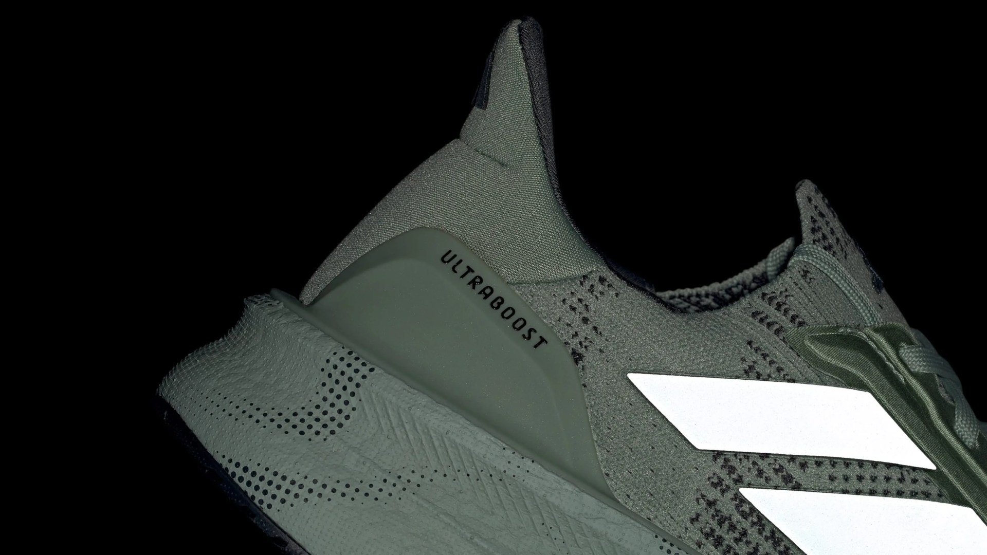 Adidas Ultraboost 5X in silver green shown against a black background