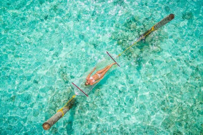 girl in a hammock in the Maldives