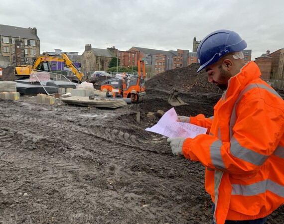 Construction student, Moiz, out on a site visit 