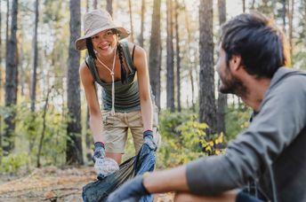 Volunteers cleaning a public hiking trail.