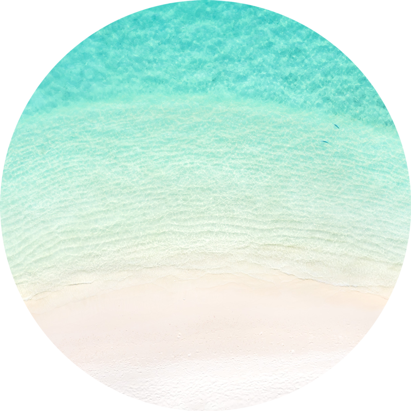 Ocean Aerial Maldives . ChromaLuxe round metal print of the ocean. Aerial oceanscape above crystal clear ocean in the island paradise of the Maldives. Wall art delivered and ready to hang.