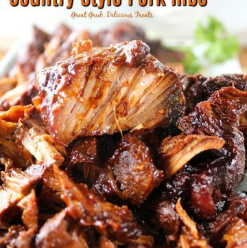 A close up of boneless pork ribs on a white plate.