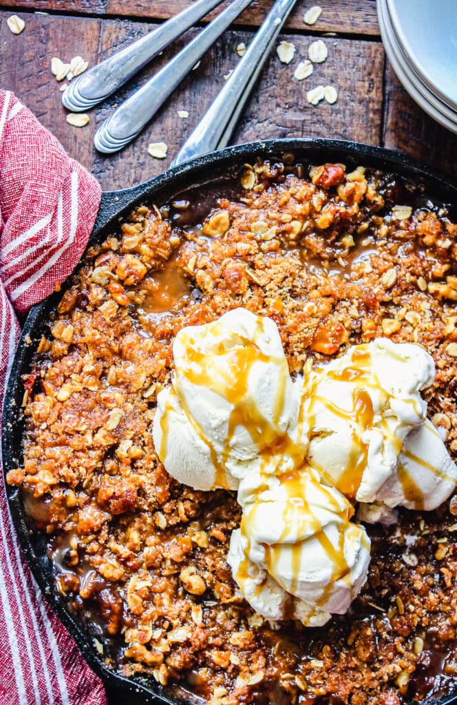 cast iron skillet of smoked apple crisp