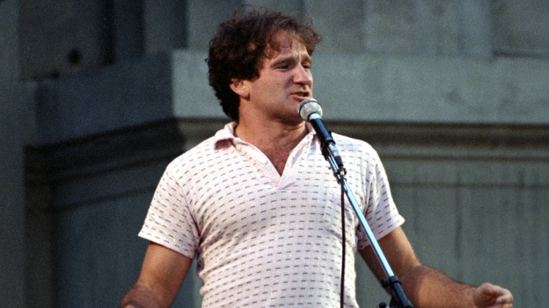 Robin Williams at the microphone