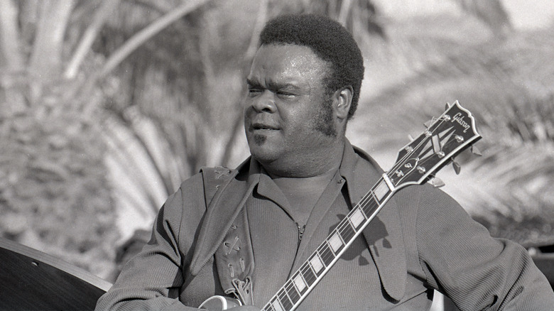 Freddie King playing guitar