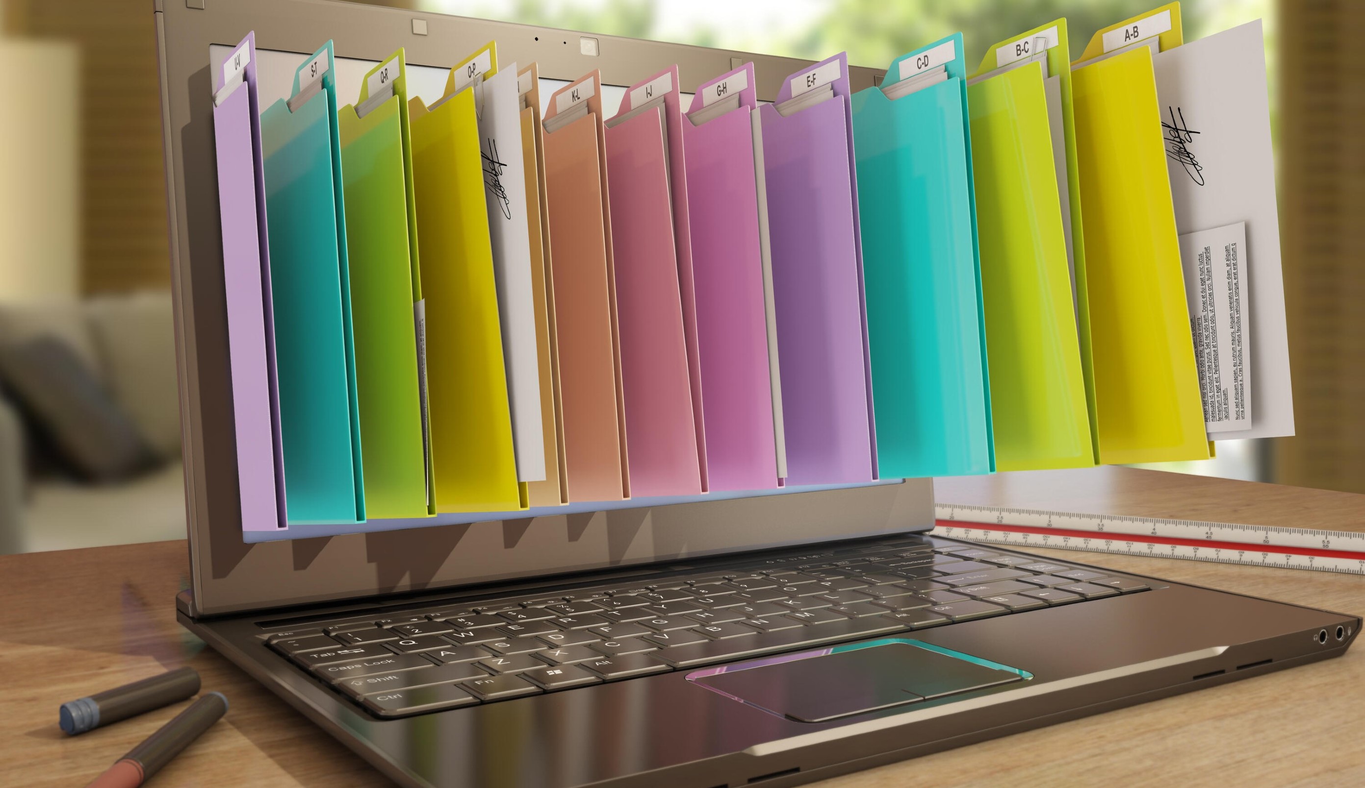 3-dimensional multicolored files floating from a laptop