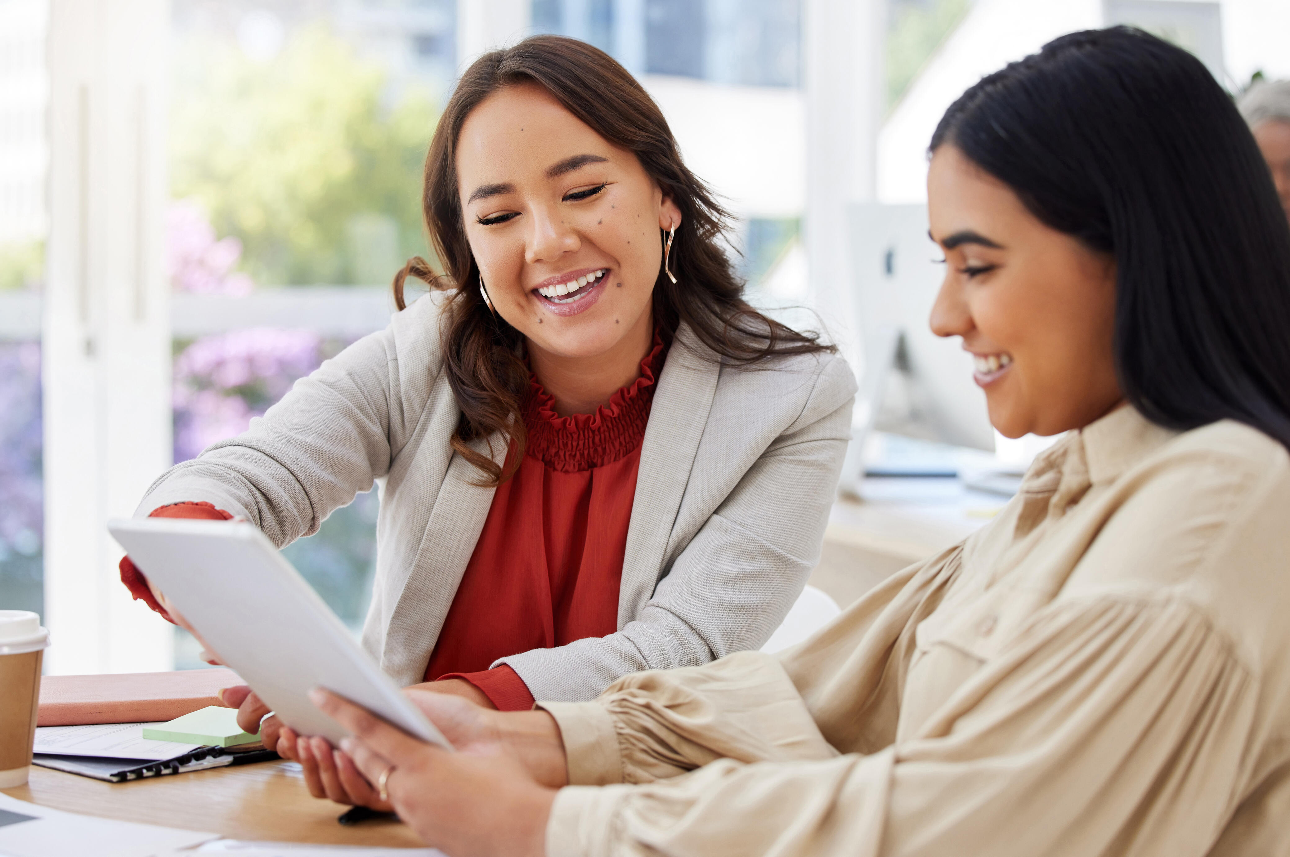 two women reviewing a document