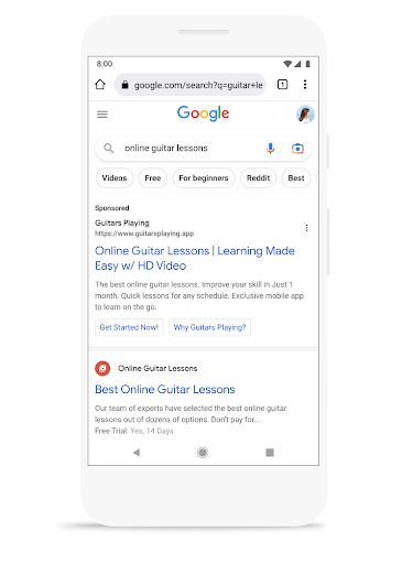 Mobile device showing search results for ‘online guitar lessons’ with a sponsored result