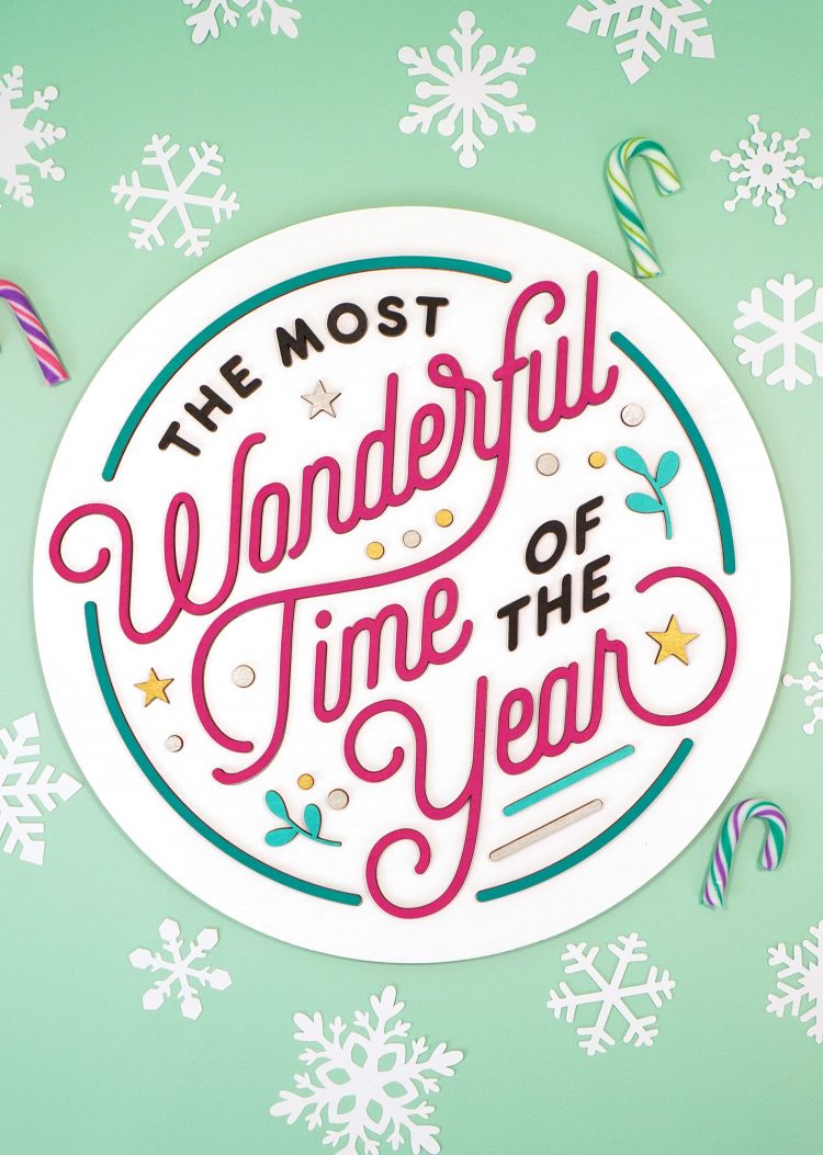 "The Most Wonderful Time of the Year" Laser Cut Wood Sign on mint green background