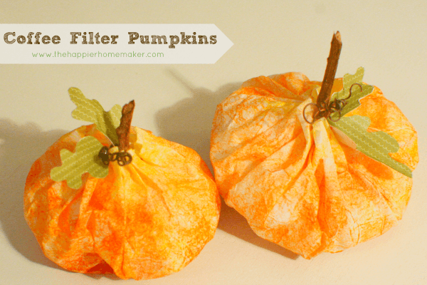 Stuffed orange dyed coffee filter in shape of a pumpkin