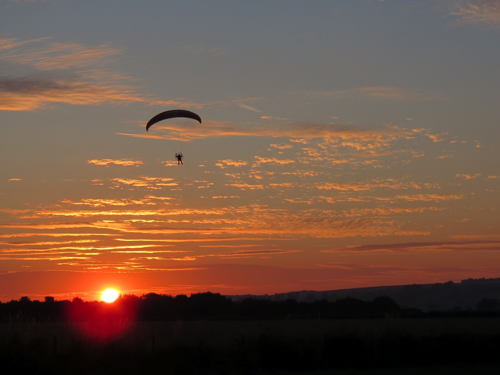 sunset paramotoring image