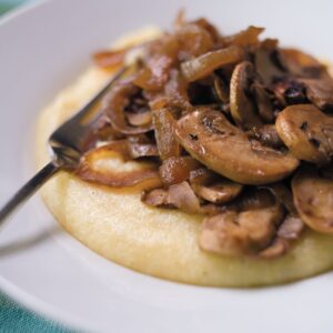 Creamy polenta with caramelised onions and mushrooms