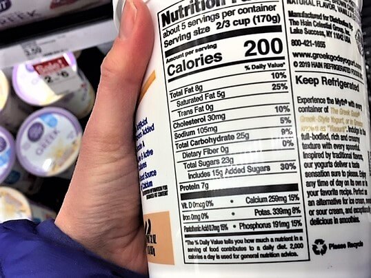 photo of label on yogurt container, showing how much sugar per day we get from supposedly healthy foods