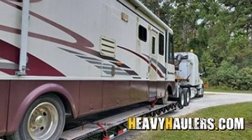 Motorhome transport on an rgn trailer.