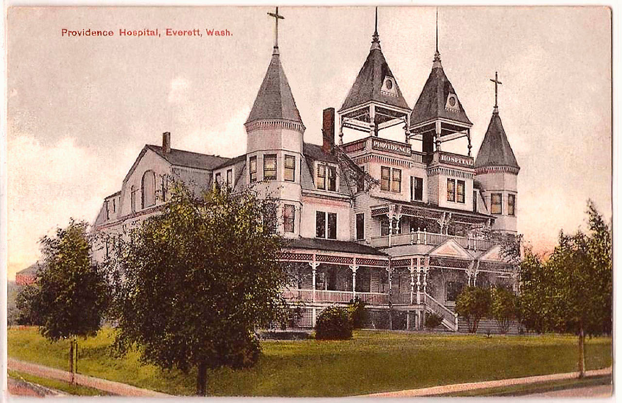 The first Providence Hospital in Everett opened in 1905 in the original Monte Cristo Hotel building. Spanish influenza patients, many with pneumonia, were treated there during the 1918 epidemic. The Spanish flu sickened all 17 Providence nurses, and two nurses died. (Courtesy Everett Public Library.)