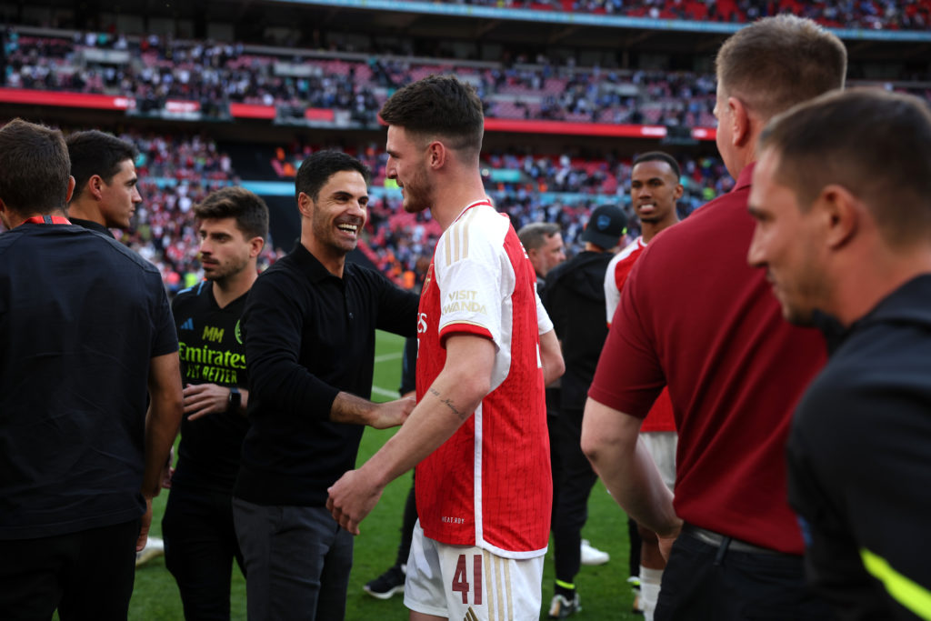 Mikel Arteta, Manager of Arsenal celebrates the team's victory with Declan Rice after the penalty shootout during The FA Community Shield match bet...