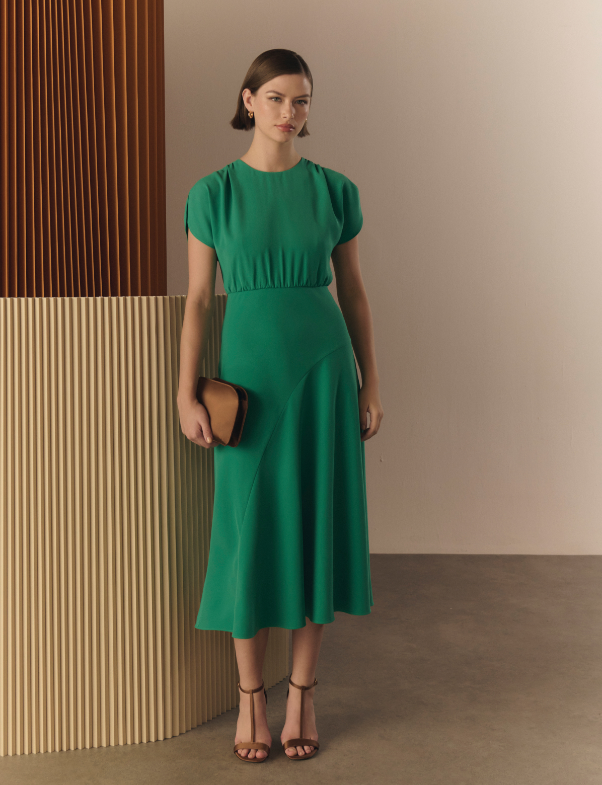 HOBBS MODEL WEARING GREEN LIMITED DRESS