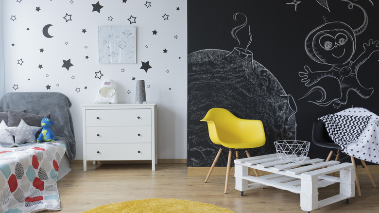 kids' room with a blackboard wall