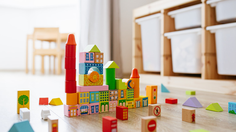 wooden building blocks on floor