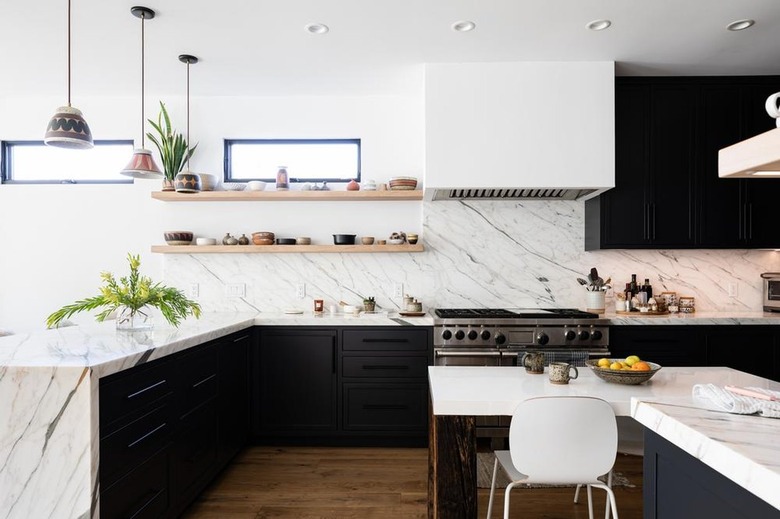 black and white kitchen with granite countertop