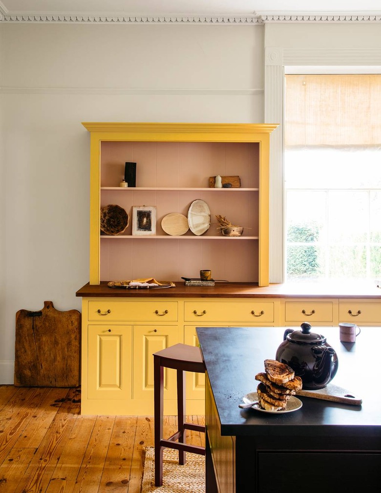 yellow kitchen with Raised Panel Cabinetry