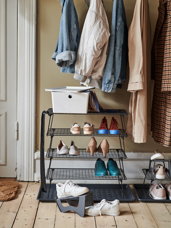 A hallway with a grey MURVEL shoe organiser.