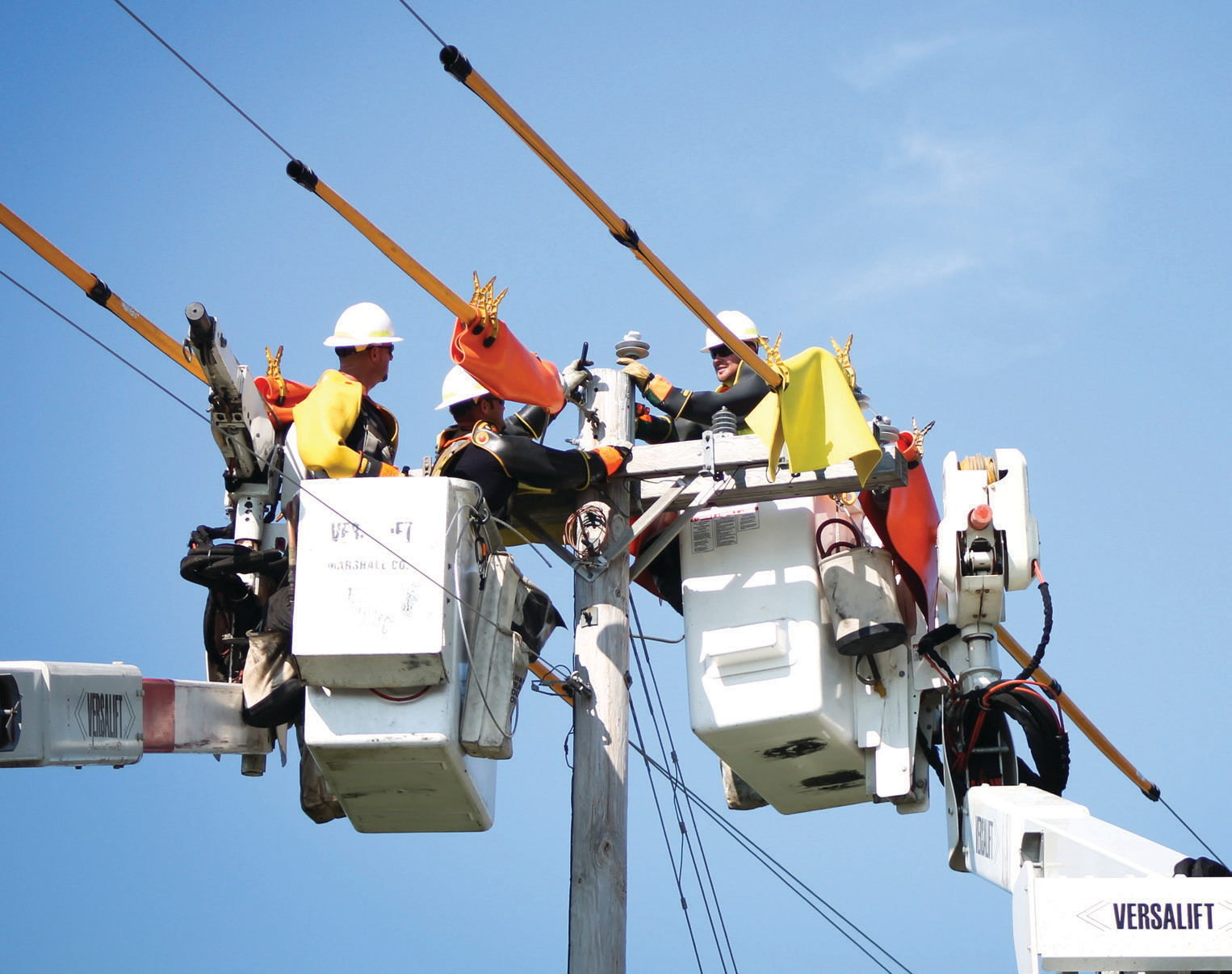 Lineman working on a pole at Marshall County REMC