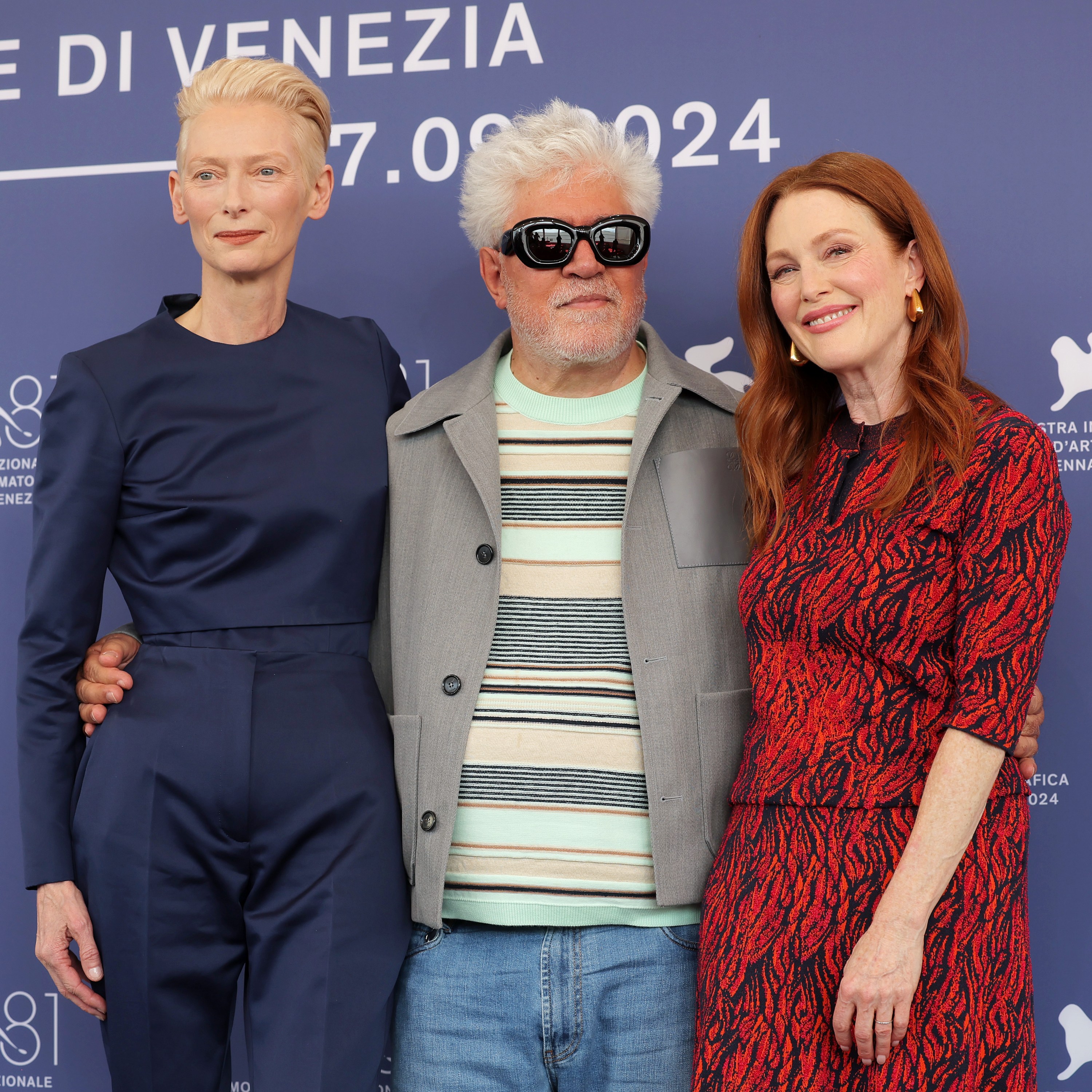 VENICE, ITALY - SEPTEMBER 02: (L-R) Tilda Swinton, Pedro Almodóvar and Julianne Moore attend the 'The Room Next Door' photocall during the 81st Venice International Film Festival at Palazzo del Casino on September 02, 2024 in Venice, Italy. (Photo by Victor Boyko/Getty Images)