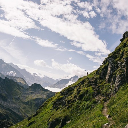 Trail runner Andy Cochrane running a hut-to-hut in the Swiss Alps