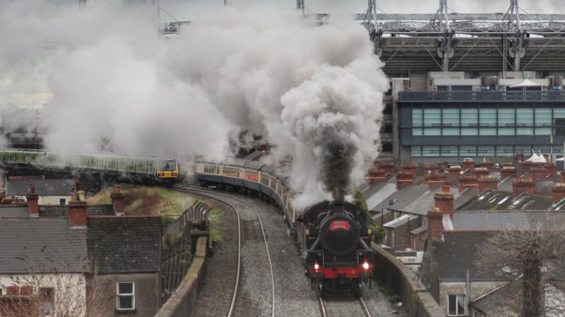 The Railway Preservation Society of Ireland’s Santa Express makes its way through Drumcondra under the shadow of Croke Park in 2018. The society's Santa trains are the most popular tours they run. Photograph: Kevin O’Brien