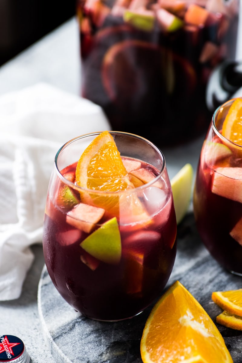 Sangria recipe in a glass with an orange slice